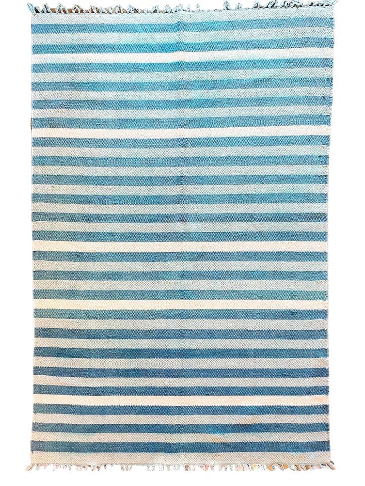 11003